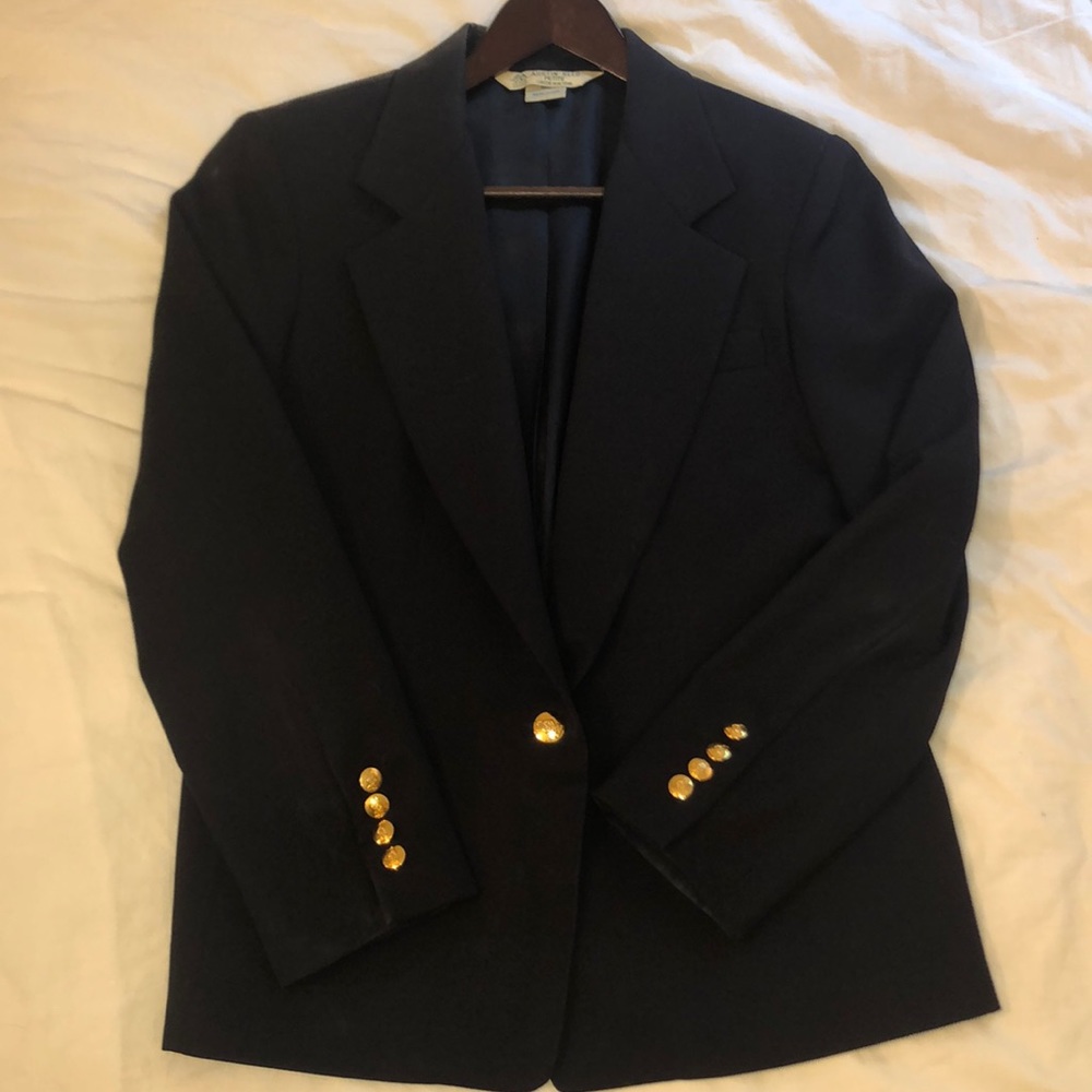 Woman’s Austin Reed blazer.